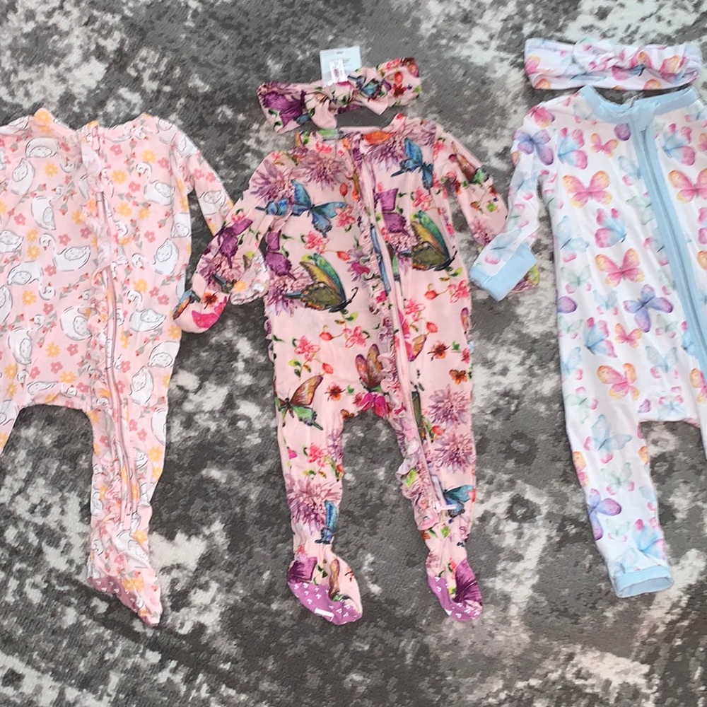 Posh peanut newborn onesies and bows